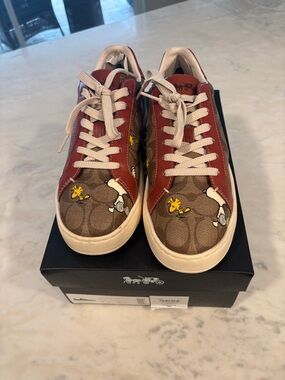 Coach X Peanuts Clip Low Top Sneaker
With Snoopy Print